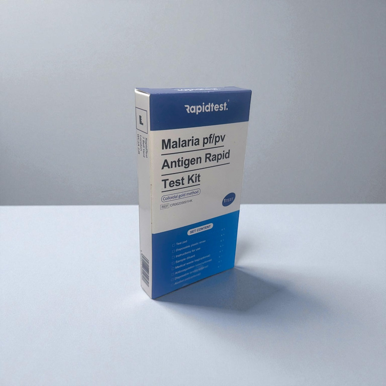 Malaria pfipv Antigen Rapid Test Kit box with 'Rapidtest' branding on a gray background