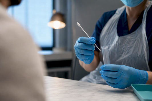 Clinician preparing an anonymous throat swab